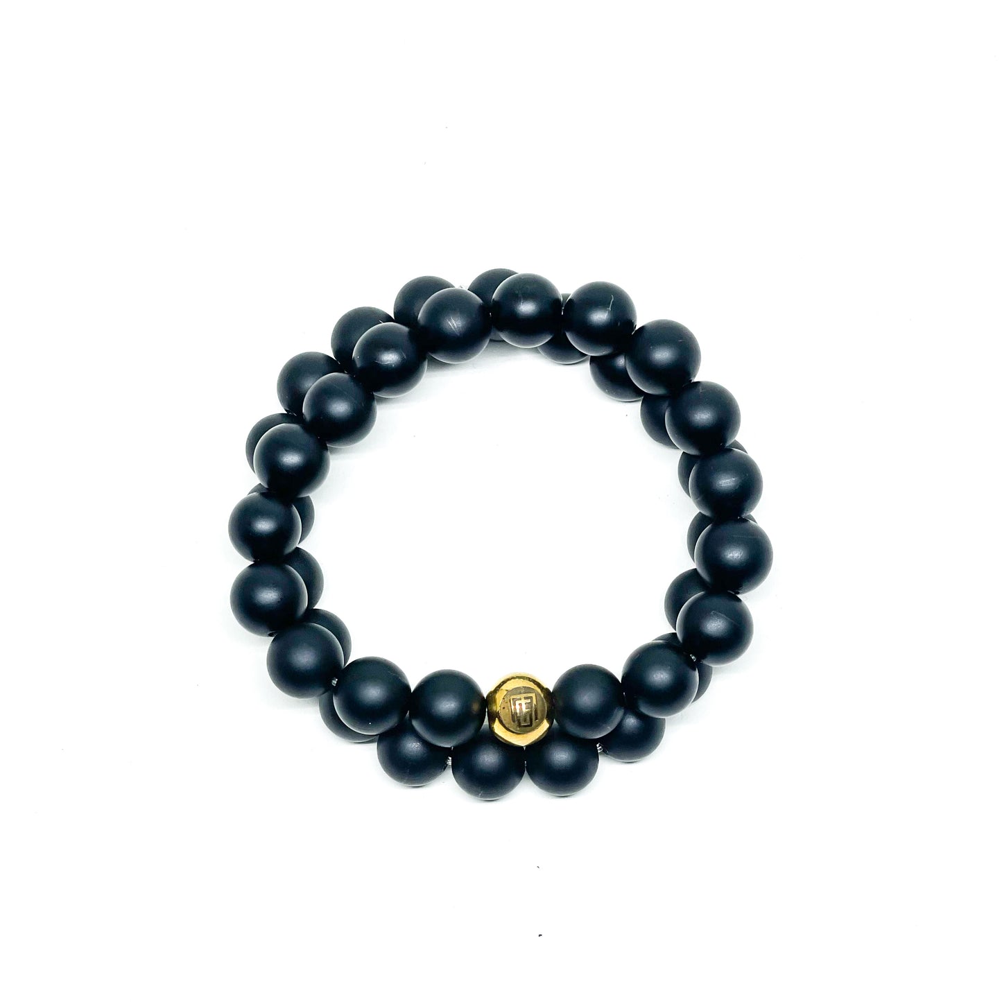 Onyx bracelets with gold over stainless steel bead. Stretchy Men’s bracelets with Onyx.