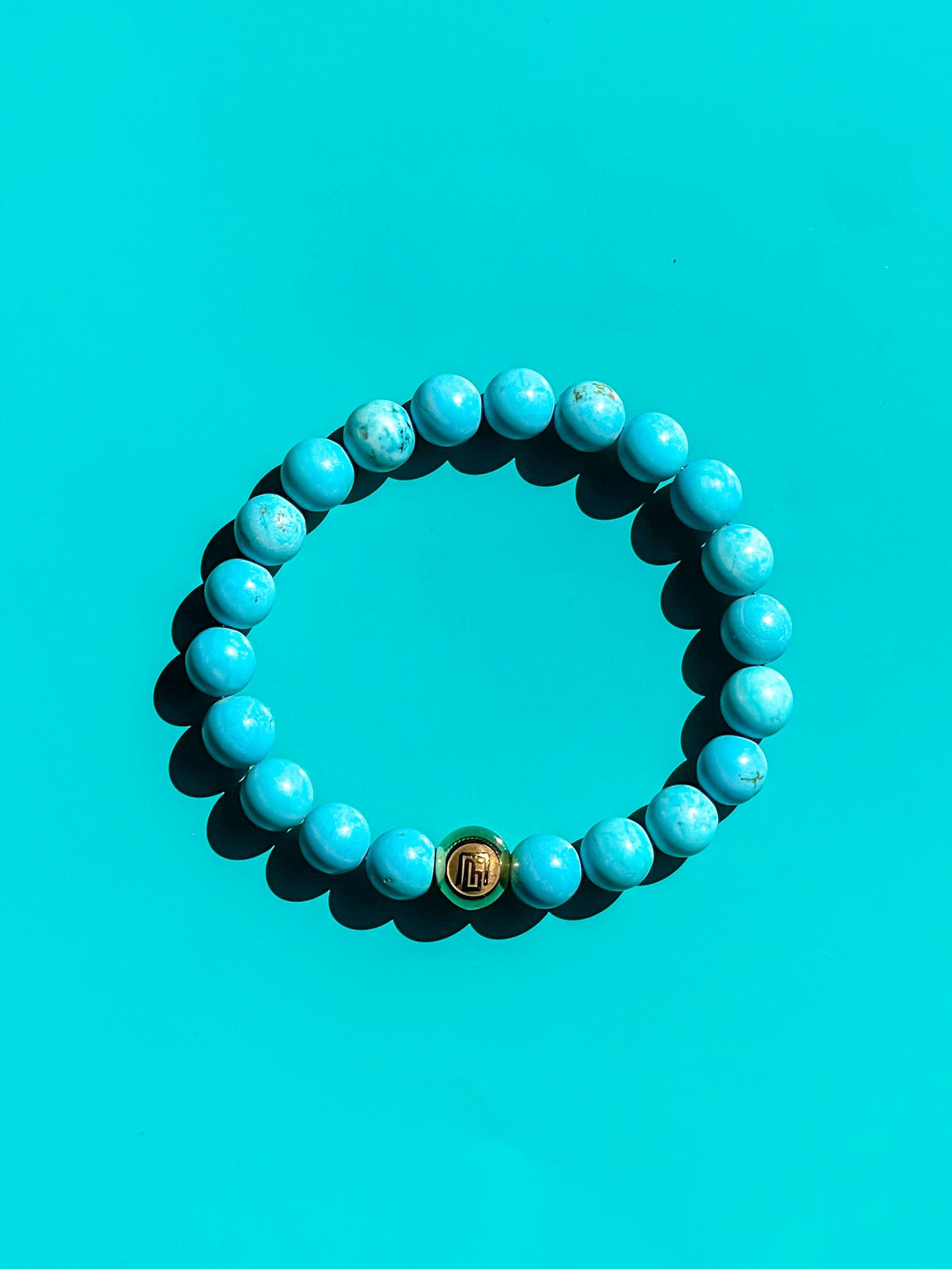 Turquoise And Gold Plated Logo Bead Men’s Bracelet.