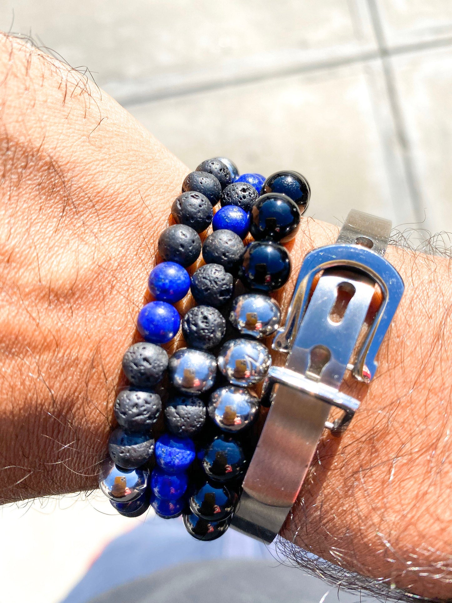 Men’s Bracelet with Onyx and stainless steel crown logo beads.