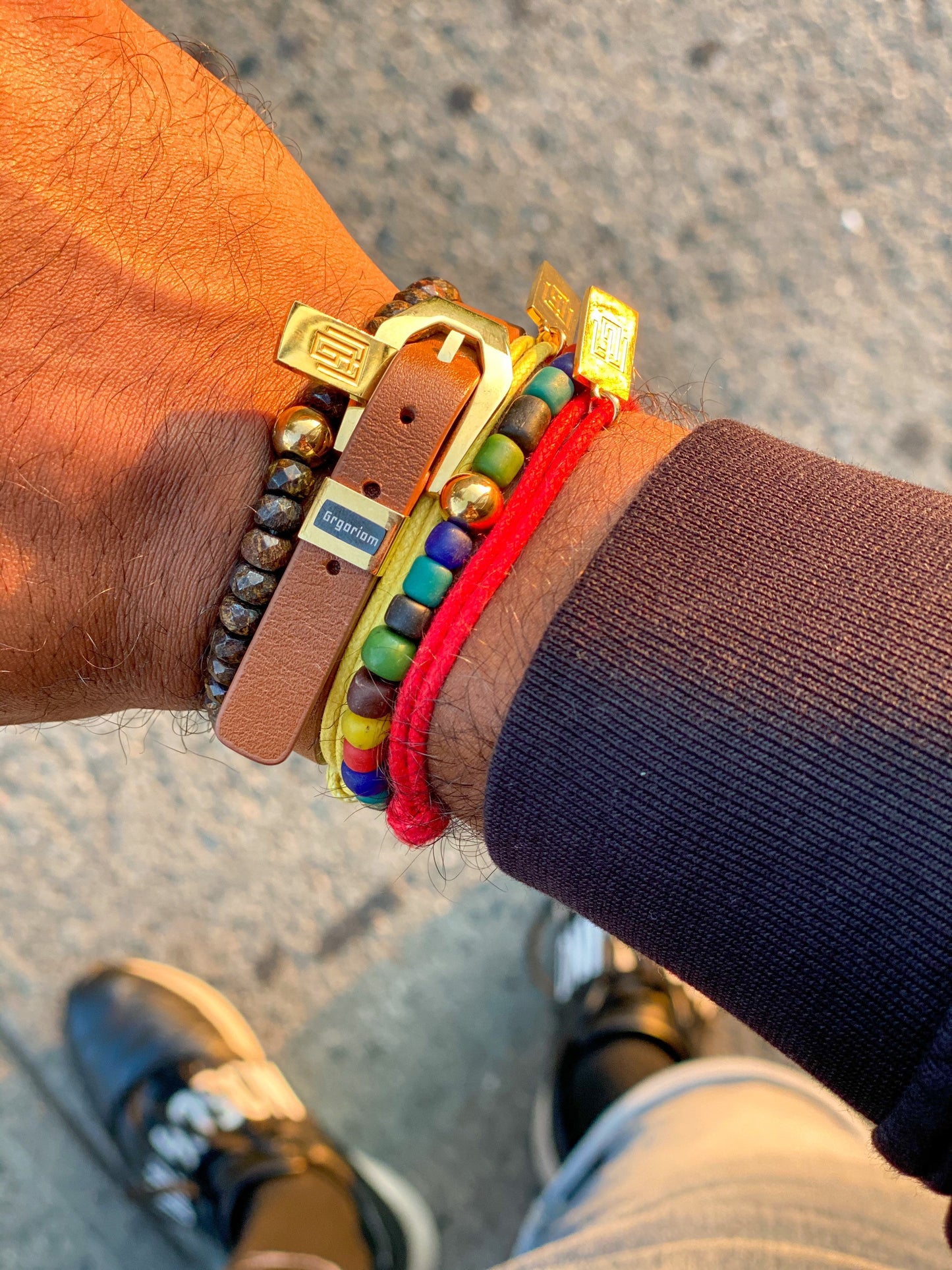 Men’s Bracelet with small Java beads and gold logo bead.