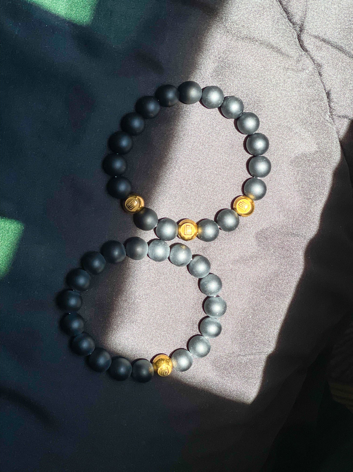 Men’s Bracelet With Matte Onyx And Gold LOGO Beads.